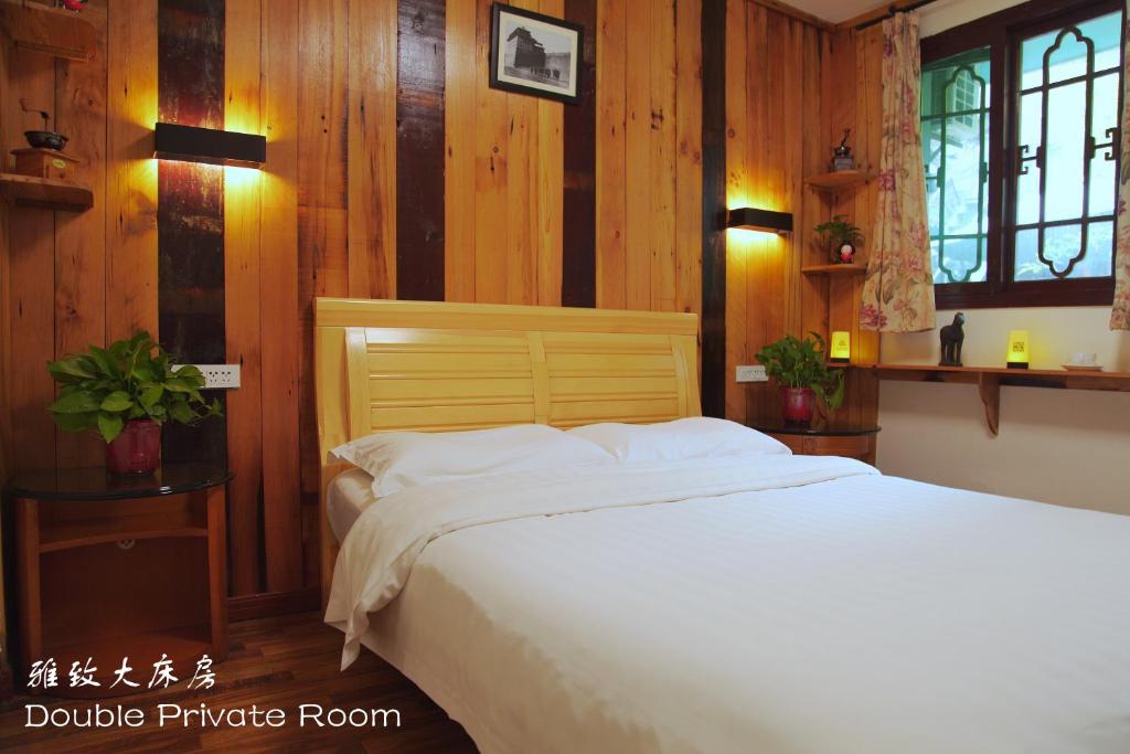 Cama o camas de una habitación en Shuyuan Youth Hostel Xi'an