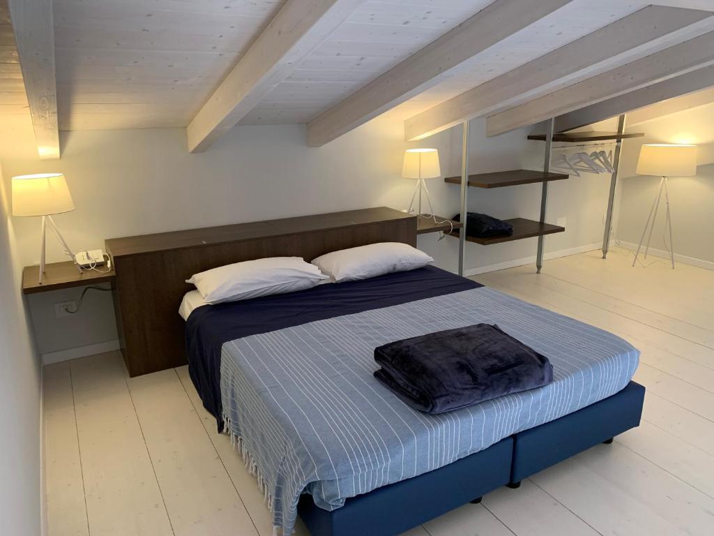 Postel nebo postele na pokoji v ubytování Le Querce Apartments