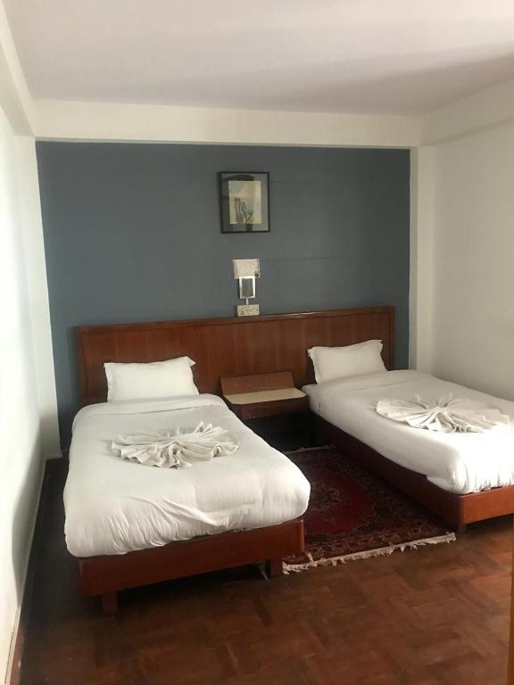 Postel nebo postele na pokoji v ubytování Hotel Earth House