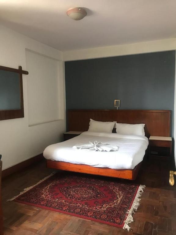 Postel nebo postele na pokoji v ubytování Hotel Earth House