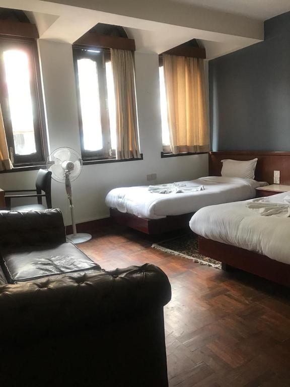 Postel nebo postele na pokoji v ubytování Hotel Earth House