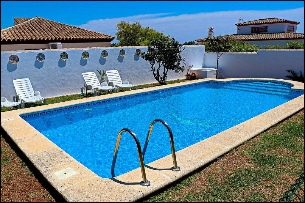 Bungalows Bungalow Ramos III, con piscina compartida en Conil de la Frontera, Andalucía