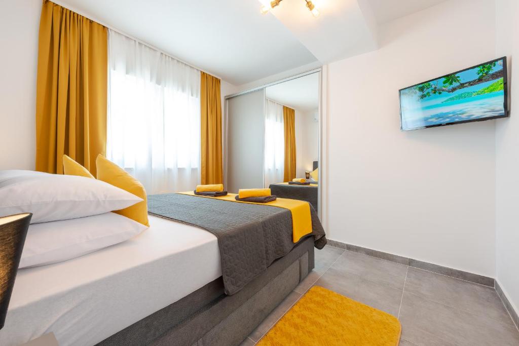 Posteľ alebo postele v izbe v ubytovaní Apartment Nia Superior