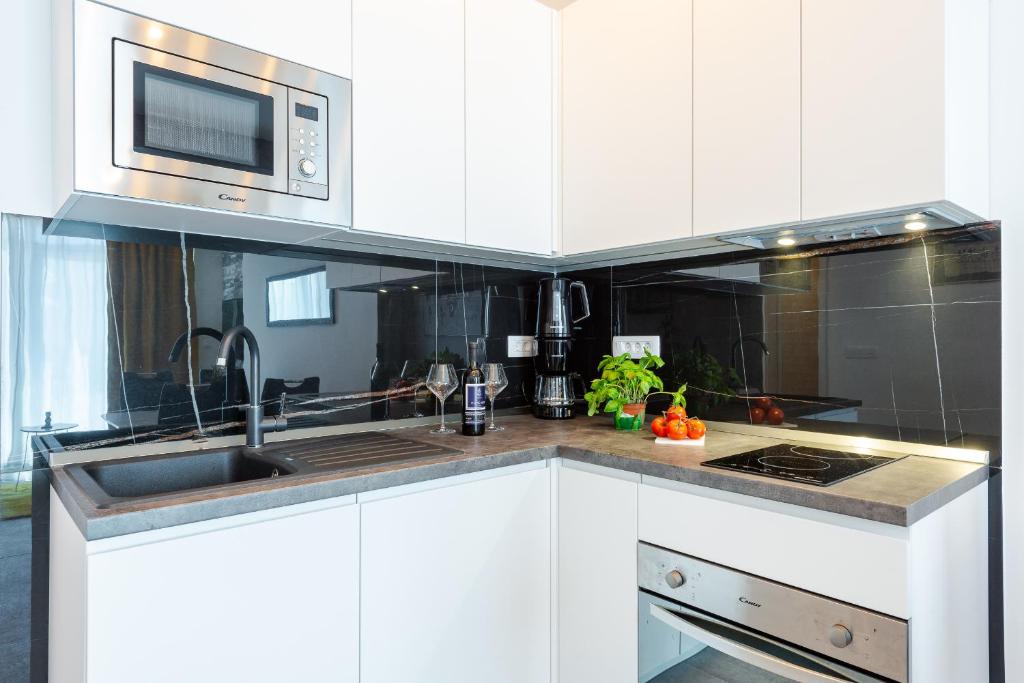 Kuchyňa alebo kuchynka v ubytovaní Apartment Nia Superior