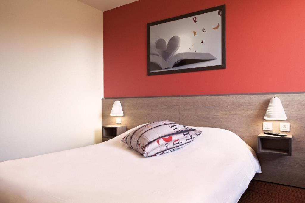 Postel nebo postele na pokoji v ubytování Ace Hotel Noyelles