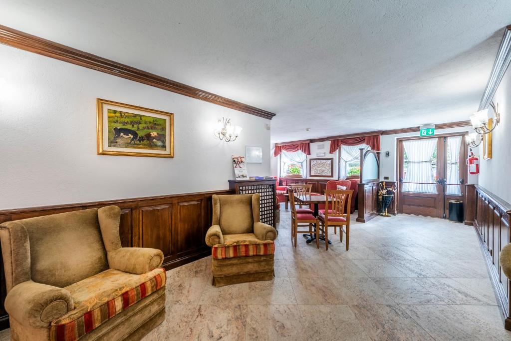 Posezení v ubytování Hotel L' Aiglon