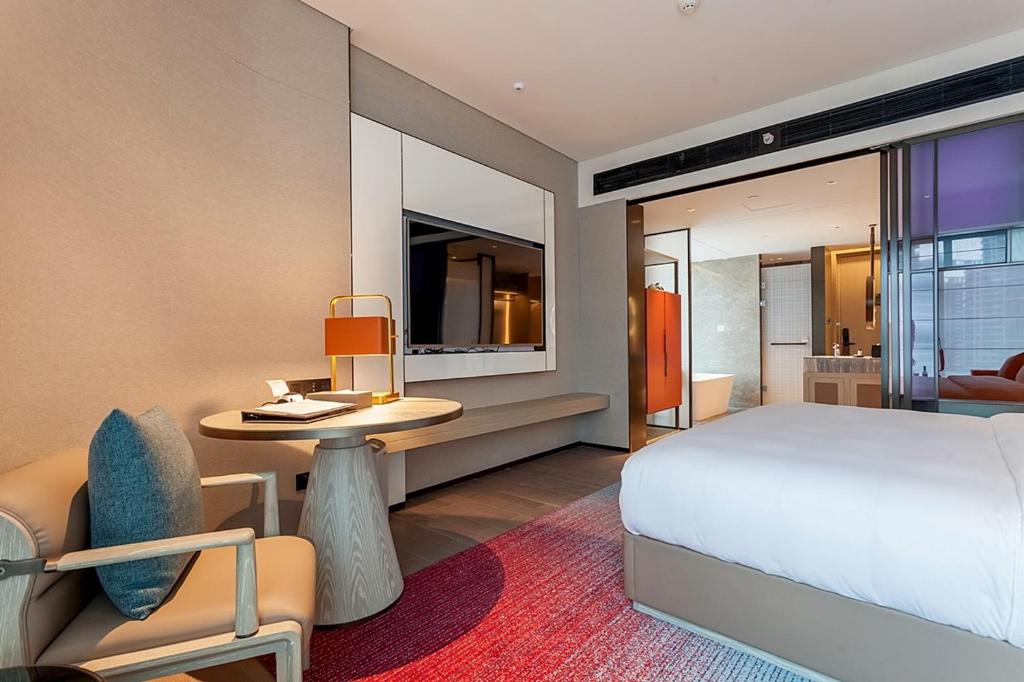 Postel nebo postele na pokoji v ubytování Tianyuan Grand Hotel Xiamen