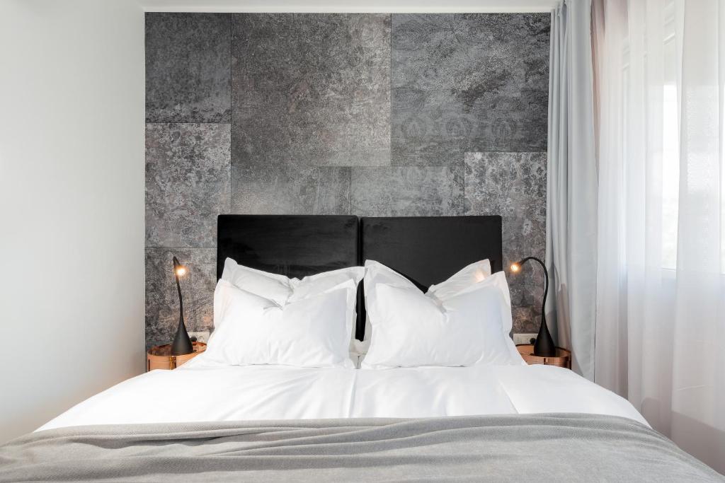 Postel nebo postele na pokoji v ubytování Skaline Luxury rooms Split