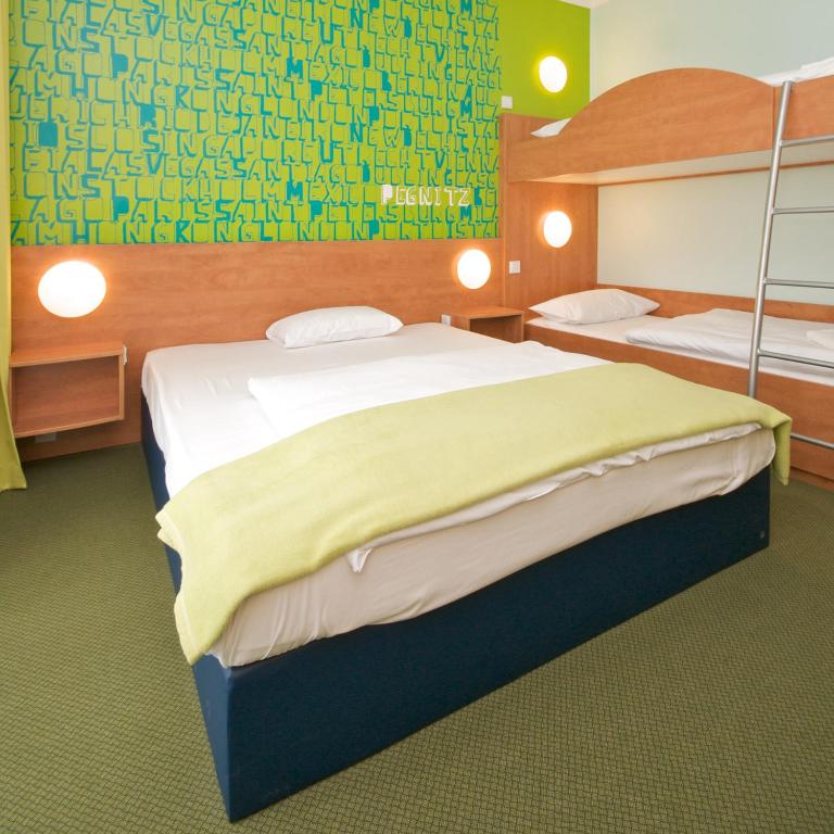 Postel nebo postele na pokoji v ubytování Hotel Fränkische Schweiz-Pegnitz
