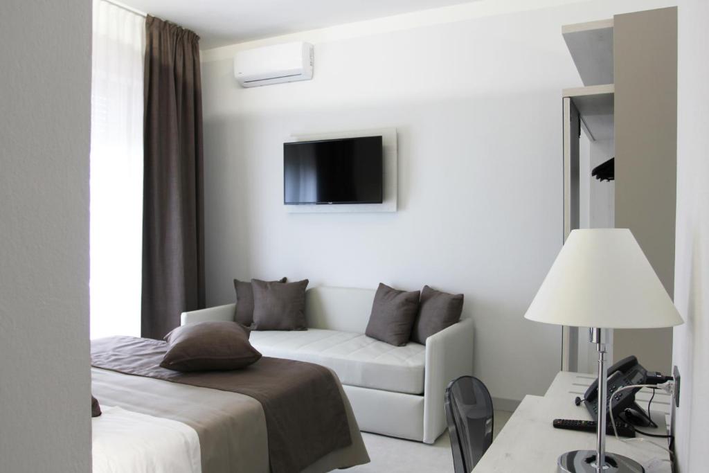 TV a/nebo společenská místnost v ubytování Park Hotel Giusy