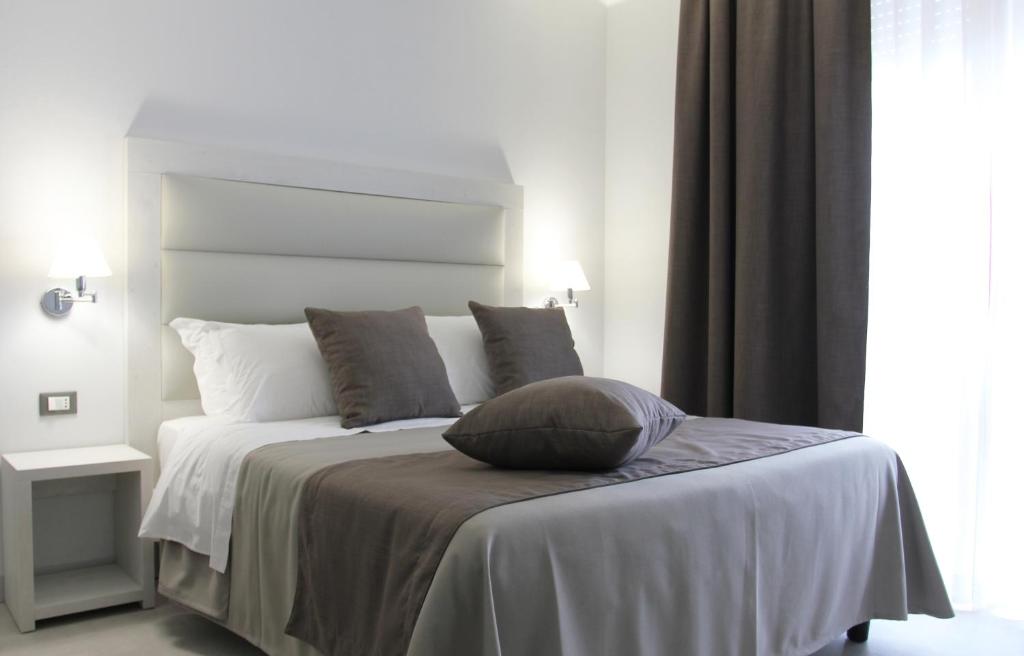 Postel nebo postele na pokoji v ubytování Park Hotel Giusy