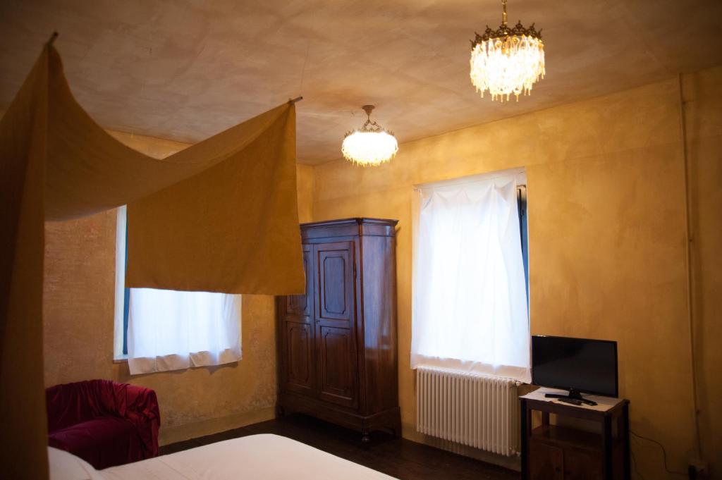 Postel nebo postele na pokoji v ubytování Corte Mantovanella