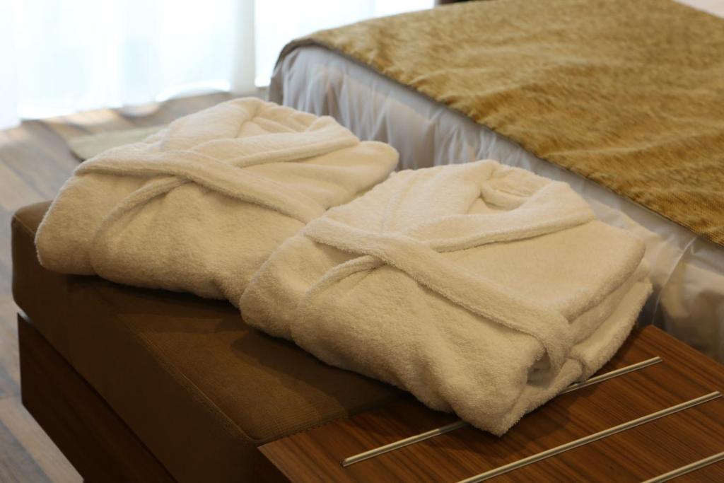 Postel nebo postele na pokoji v ubytování Hotel Solar do Rebolo