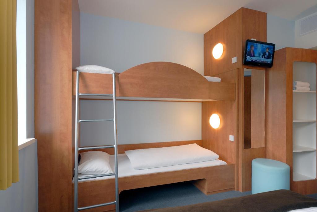 Postel nebo postele na pokoji v ubytování Hotel Fränkische Schweiz-Pegnitz