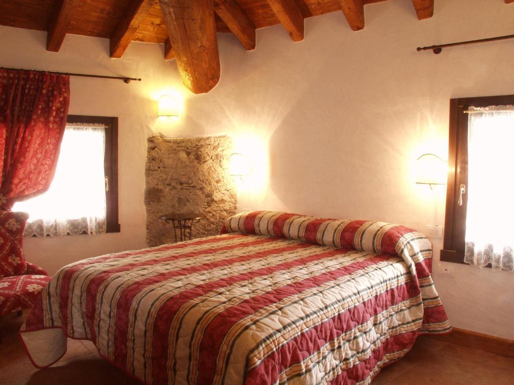 Postel nebo postele na pokoji v ubytování Bed and Breakfast Zanaglio