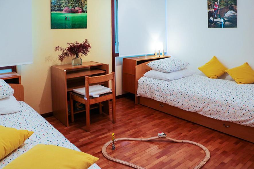 Posteľ alebo postele v izbe v ubytovaní Sunny Garden