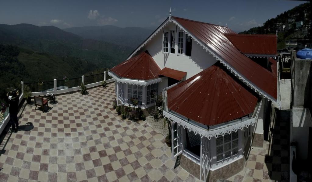 an overhead view of a building with red roofs at Yashita Homestay in Darjeeling