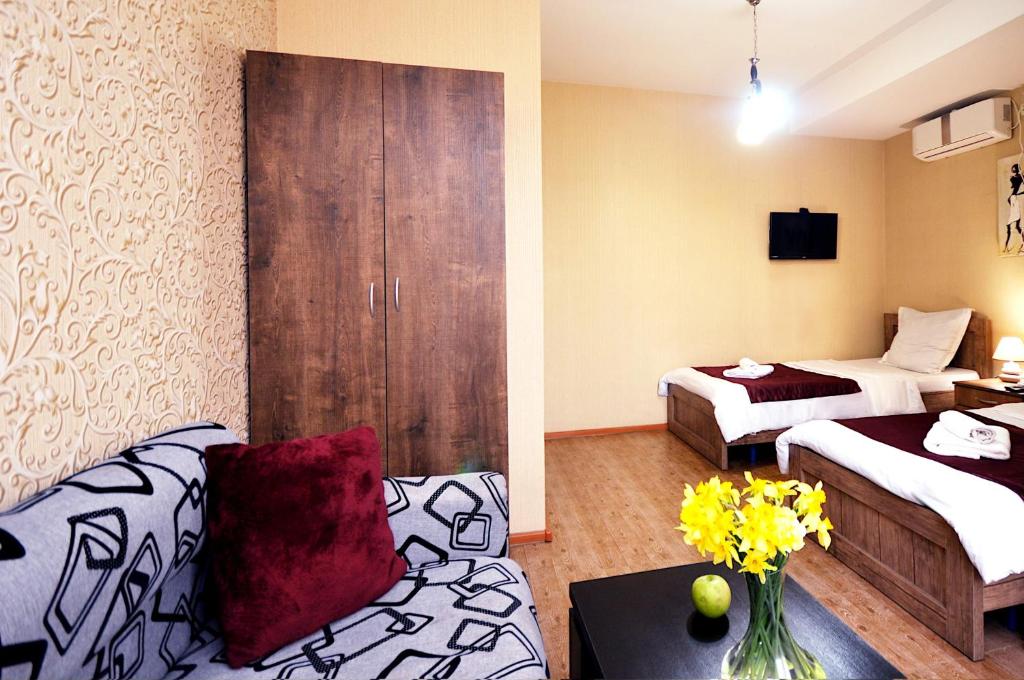 Postel nebo postele na pokoji v ubytování Hotel Kavela