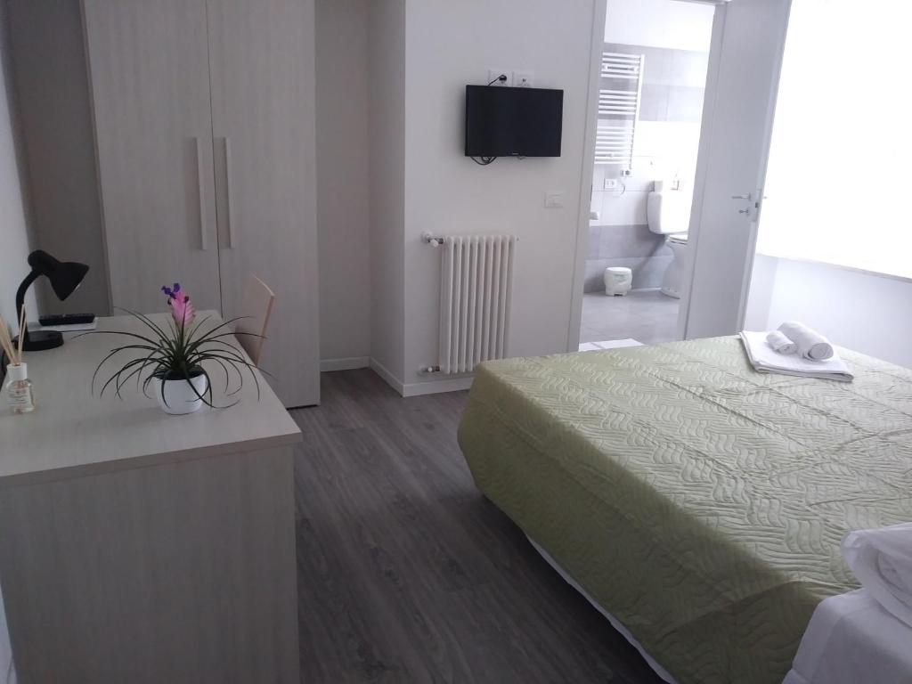 Postel nebo postele na pokoji v ubytování La Casa di Varda