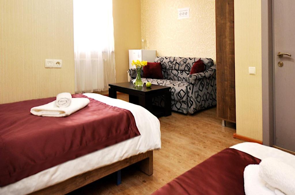 Postel nebo postele na pokoji v ubytování Hotel Kavela