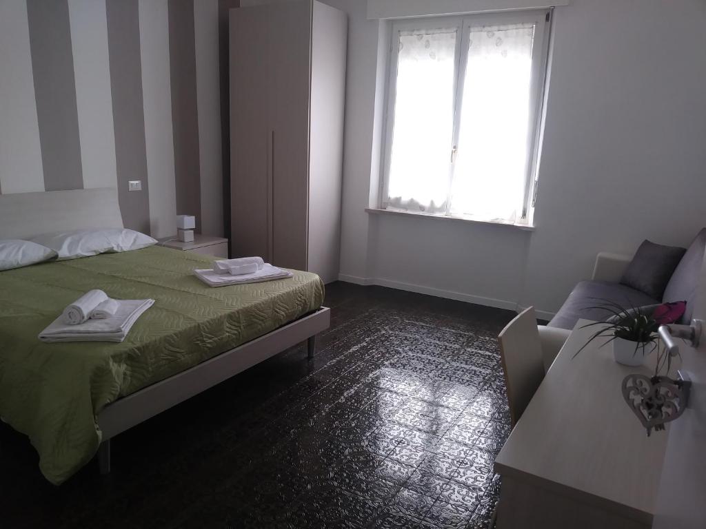 Postel nebo postele na pokoji v ubytování La Casa di Varda