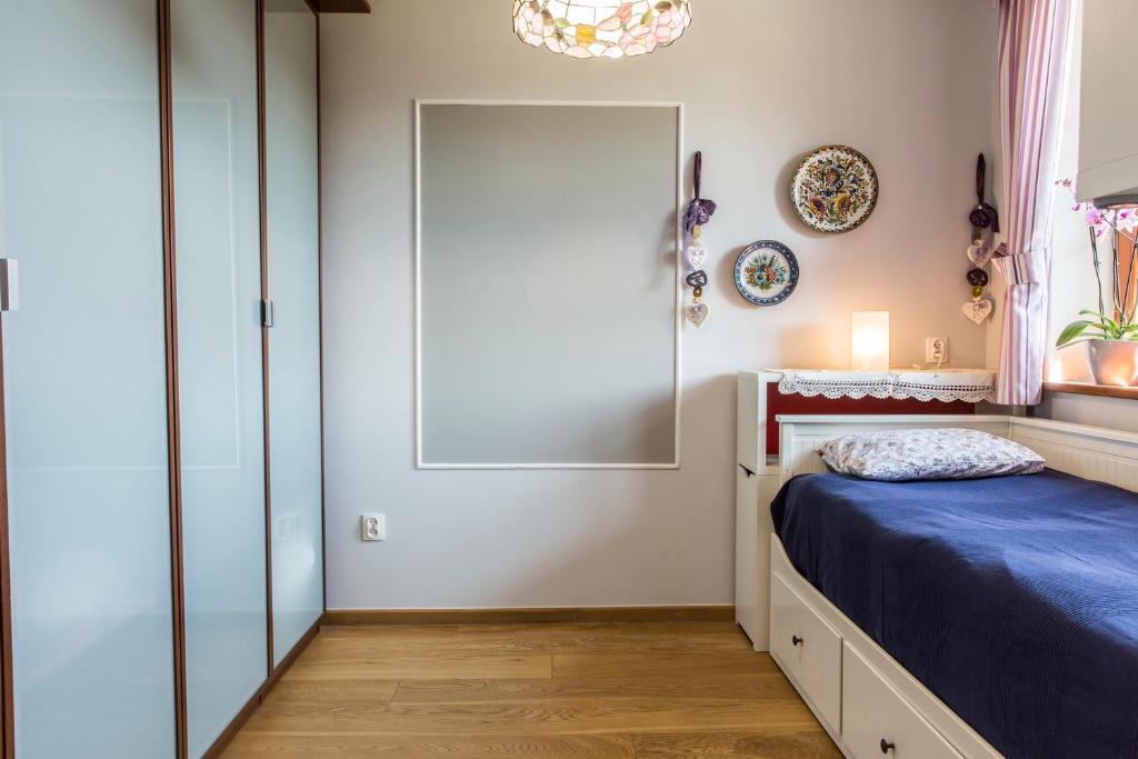 Łóżko lub łóżka w pokoju w obiekcie Apartment Tiffany