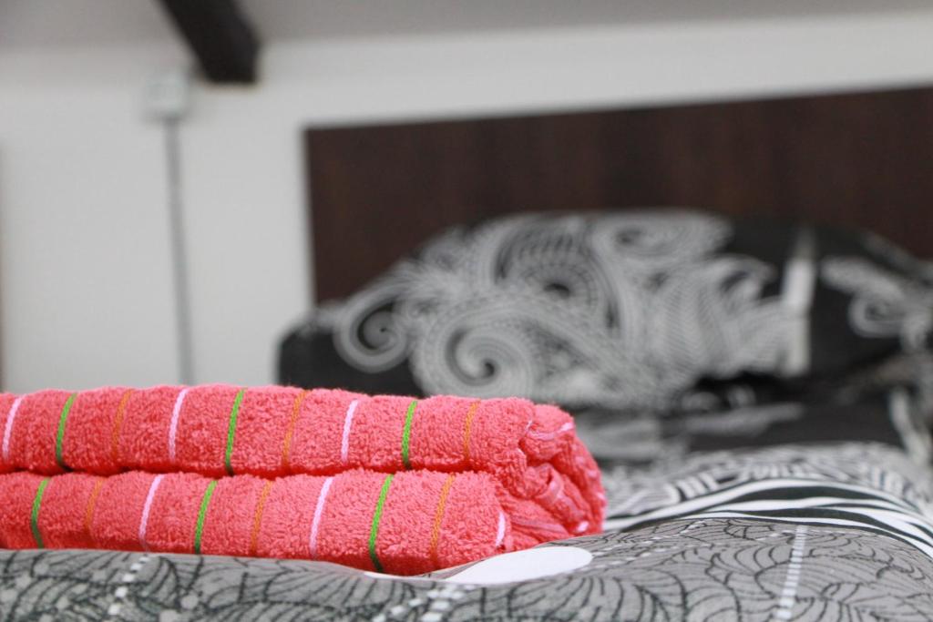 Postel nebo postele na pokoji v ubytování Sheni Hostel