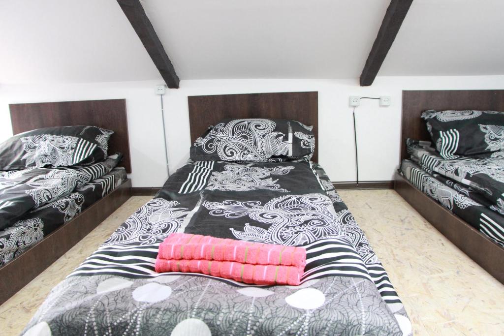 Postel nebo postele na pokoji v ubytování Sheni Hostel