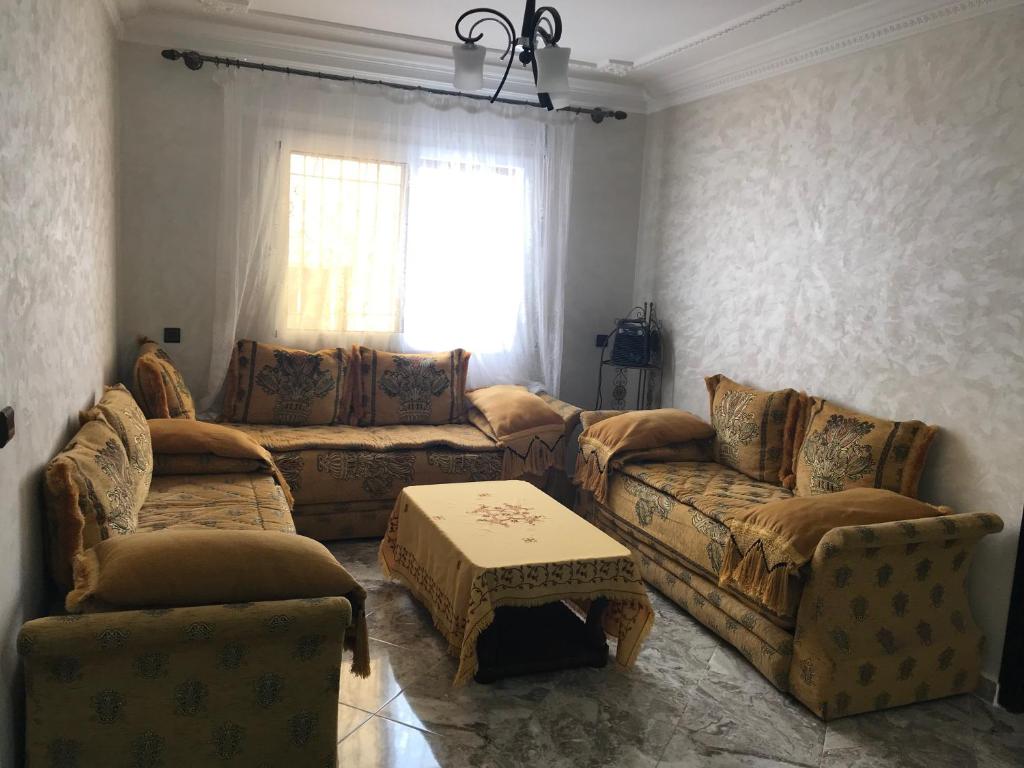 Posezení v ubytování Appartements M'diq