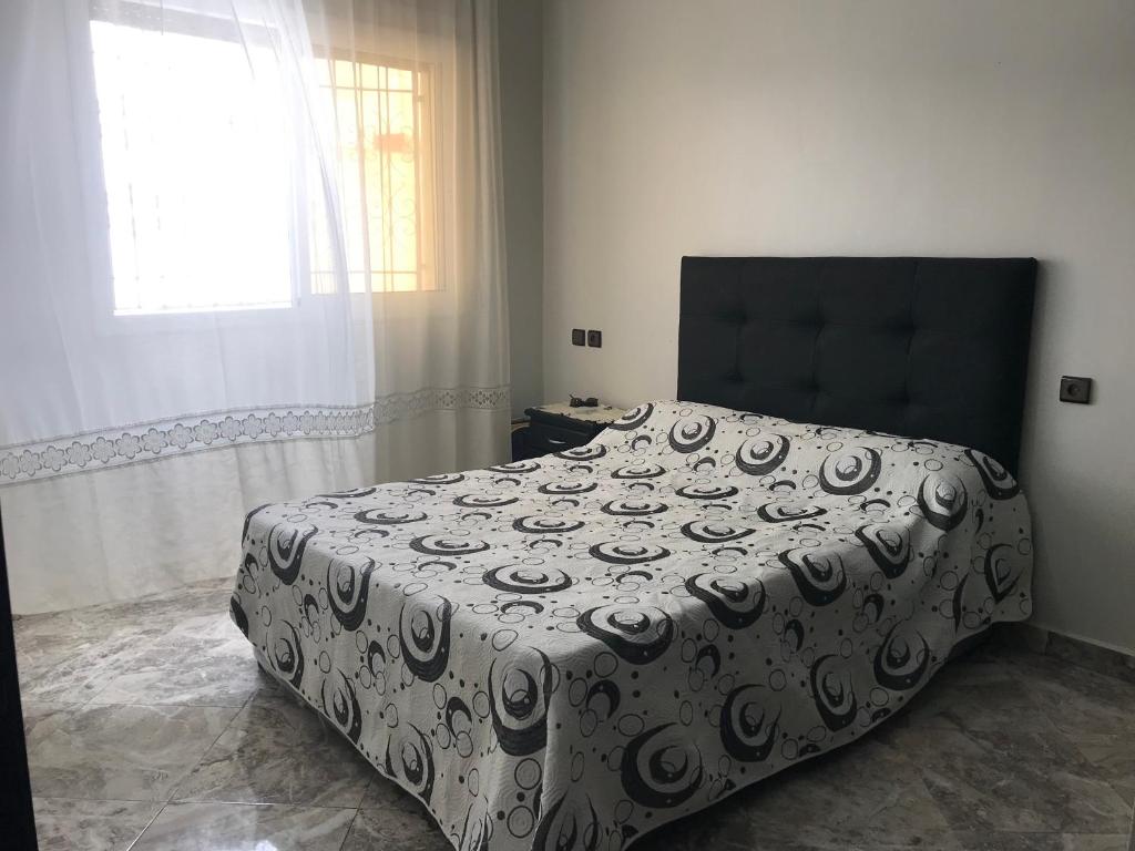 Postel nebo postele na pokoji v ubytování Appartements M'diq