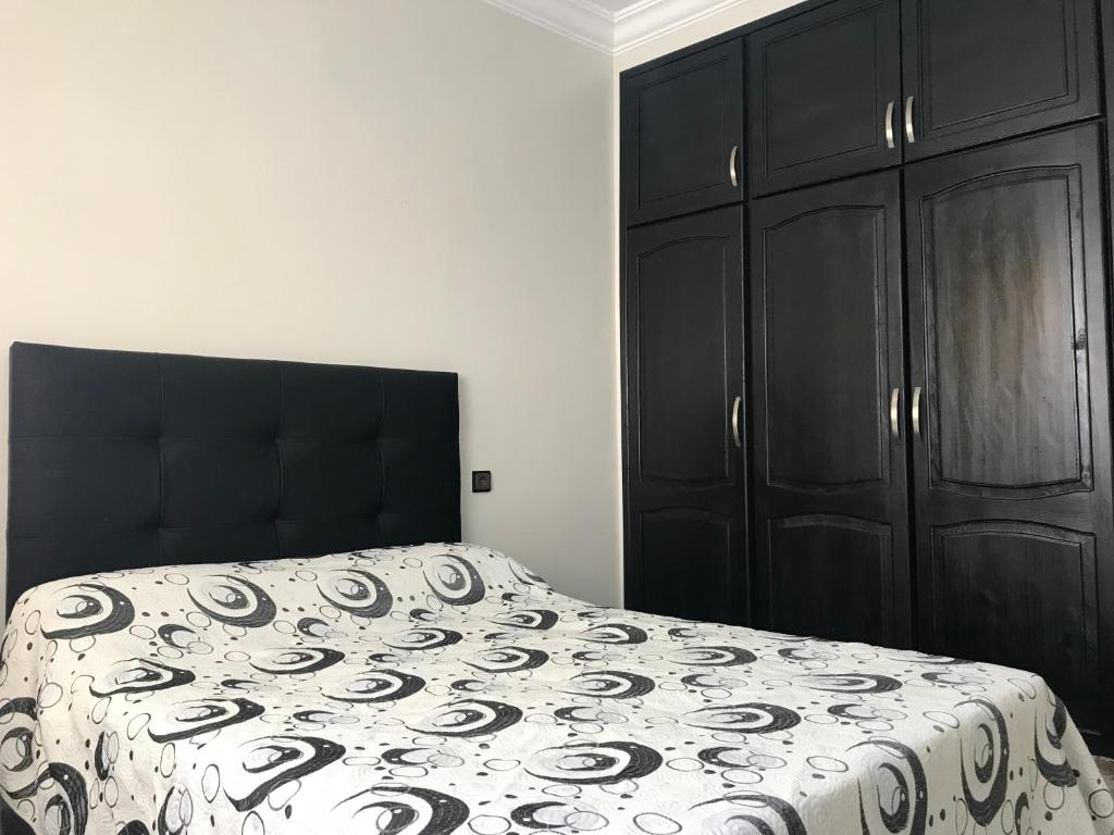 Postel nebo postele na pokoji v ubytování Appartements M'diq