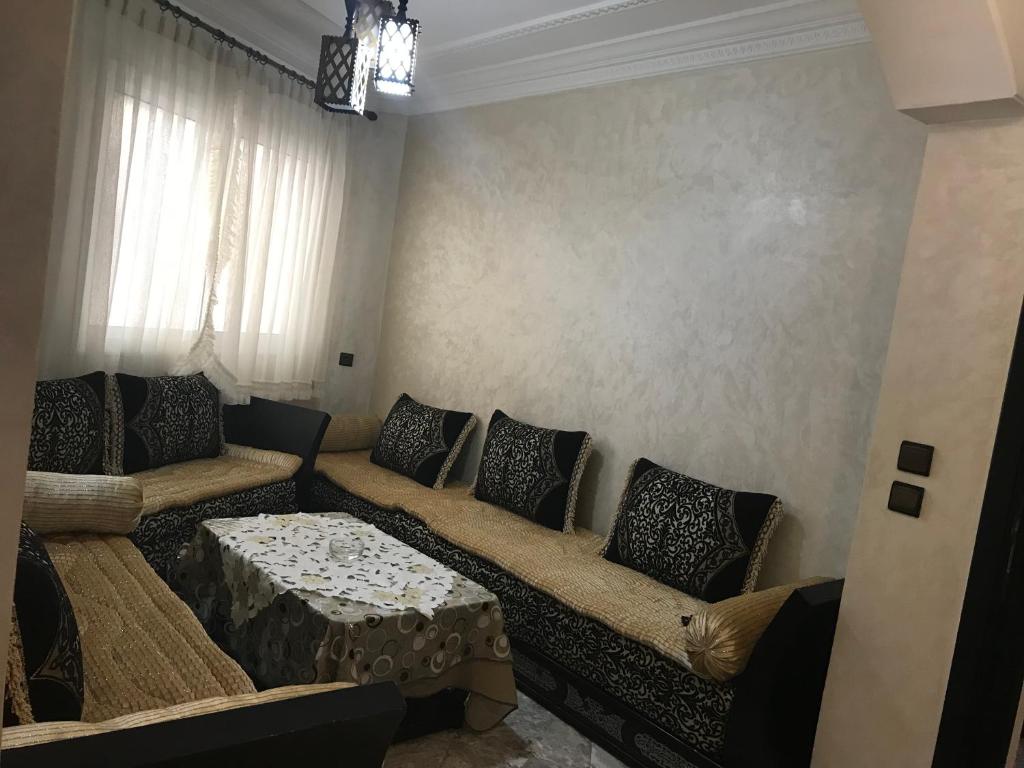 Posezení v ubytování Appartements M'diq