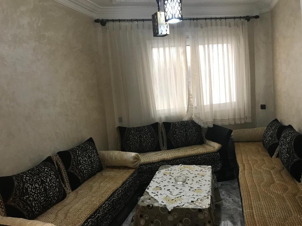 Posezení v ubytování Appartements M'diq