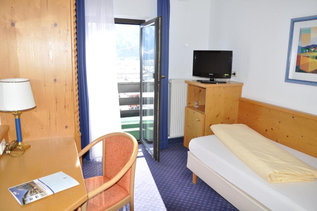 Postel nebo postele na pokoji v ubytování Allgäuer Bergbad