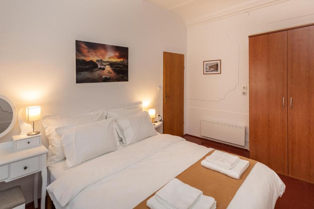 Postel nebo postele na pokoji v ubytování Apartment Mari