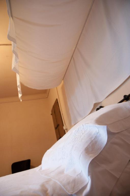 Postel nebo postele na pokoji v ubytování Corte Mantovanella