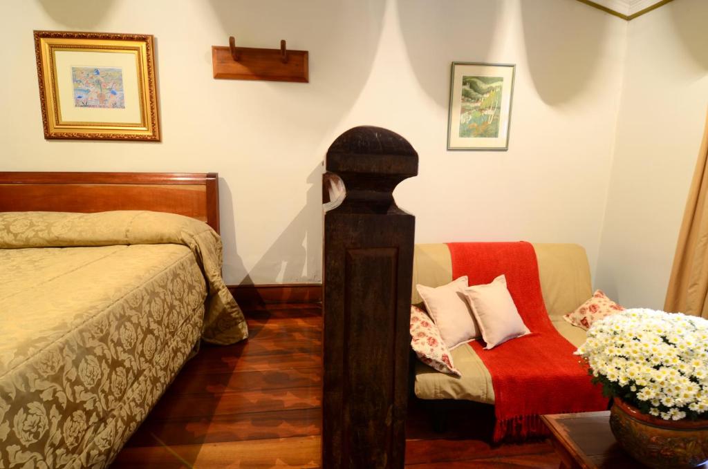 Postel nebo postele na pokoji v ubytování Hotel Pousada Casa Grande