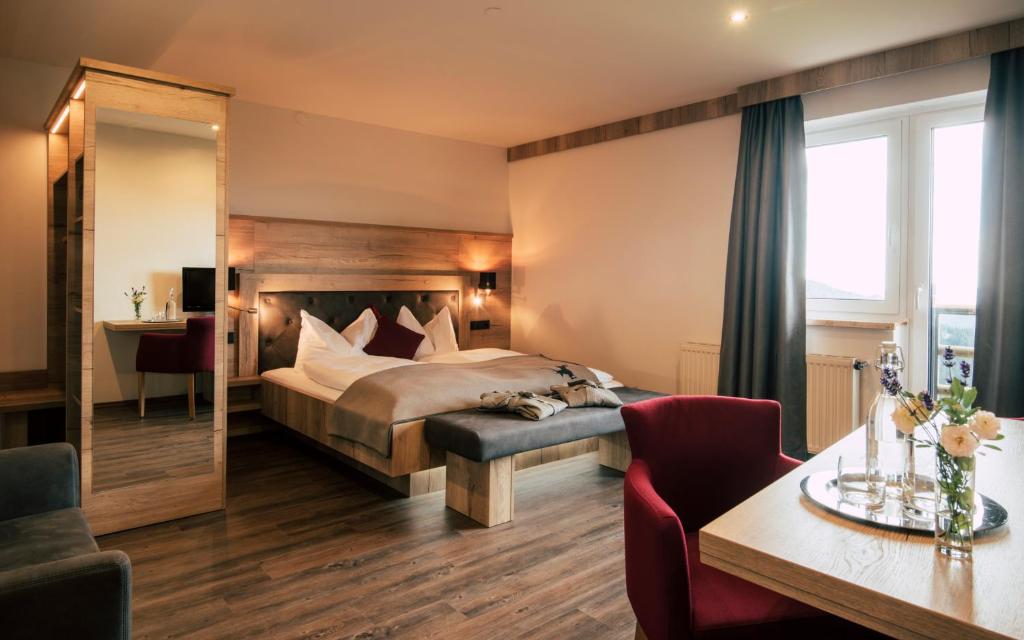 Postel nebo postele na pokoji v ubytování Hotel Schwengerer