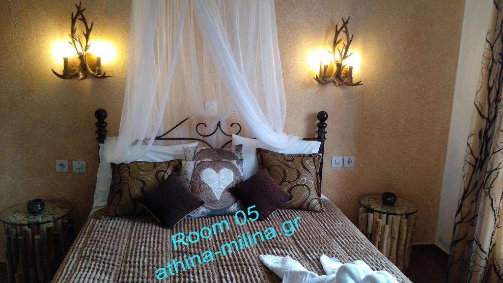 Postel nebo postele na pokoji v ubytování Athina-Milina