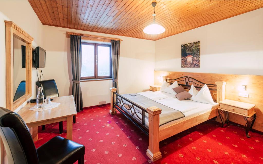 Postel nebo postele na pokoji v ubytování Hotel Schwengerer