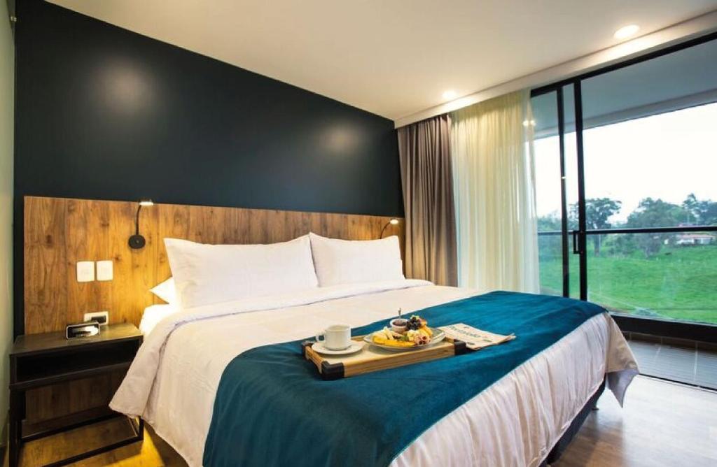 Postel nebo postele na pokoji v ubytování Hotel Lagoon