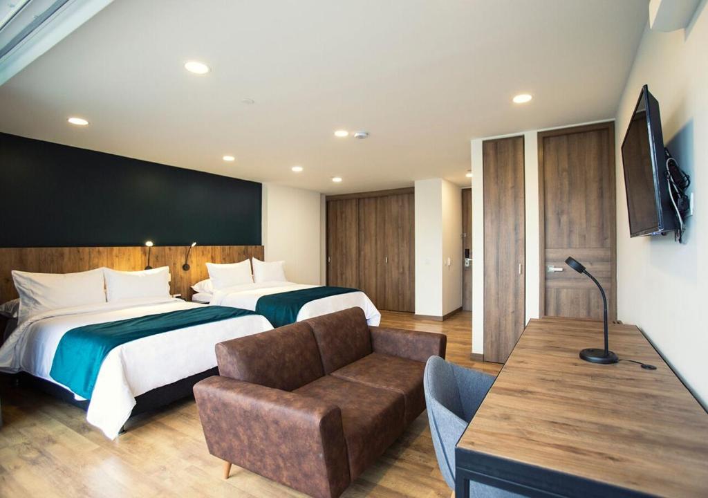 Postel nebo postele na pokoji v ubytování Hotel Lagoon