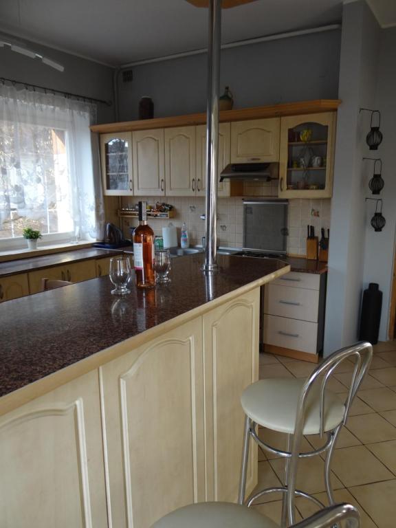 Kuchyňa alebo kuchynka v ubytovaní Korzeniowskiego 25