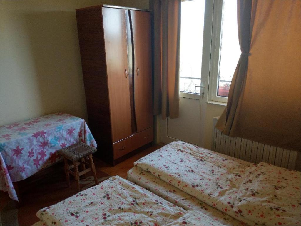 Postel nebo postele na pokoji v ubytování Lary Hostel