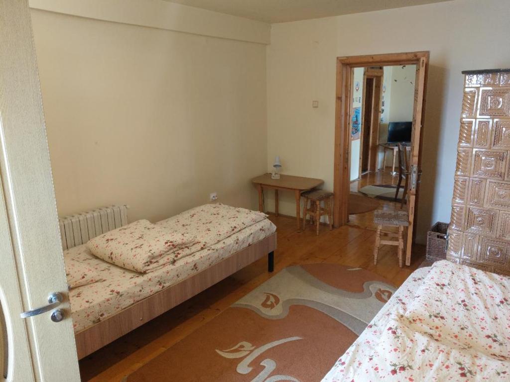 Postel nebo postele na pokoji v ubytování Lary Hostel