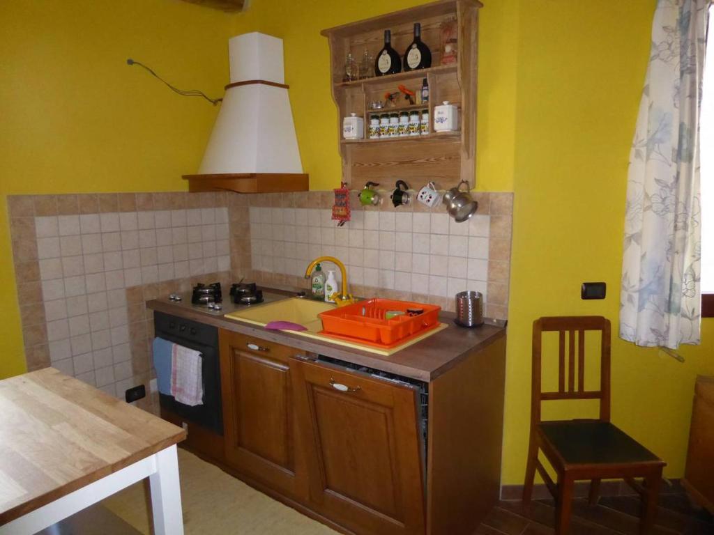 Kuchyň nebo kuchyňský kout v ubytování Il Rustico