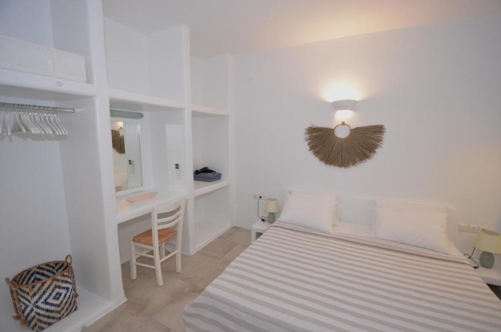 Posteľ alebo postele v izbe v ubytovaní Villa LIMANI Paros