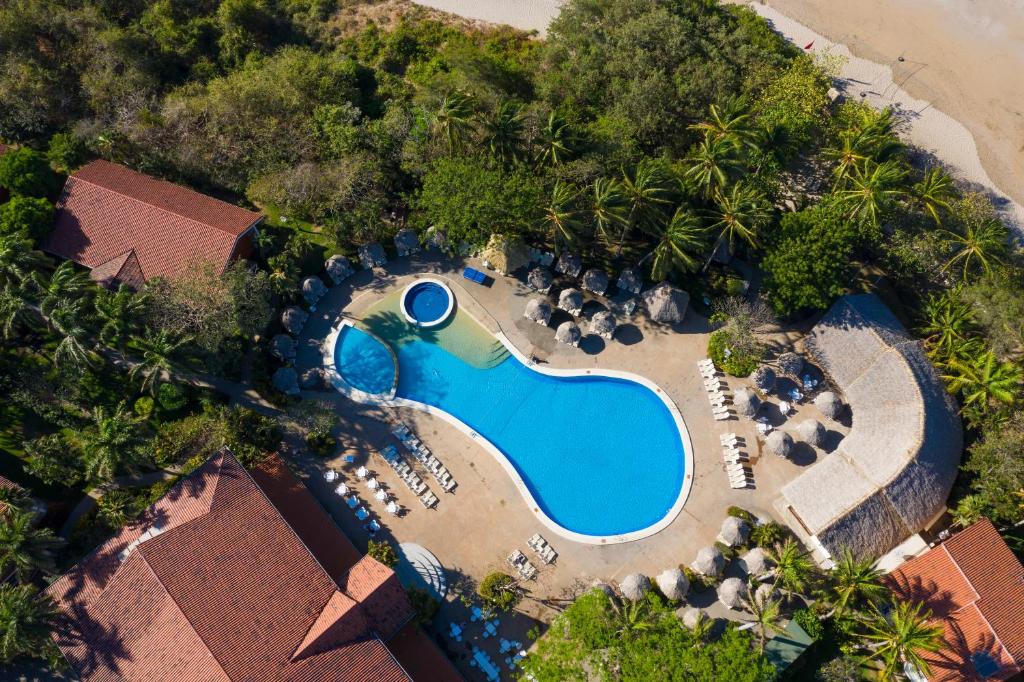 Bazén v ubytování Occidental Tamarindo - All Inclusive nebo v jeho okolí