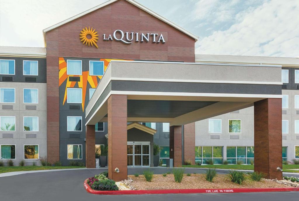 a hospital building with a sign on the front of it at La Quinta by Wyndham Austin Round Rock in Round Rock