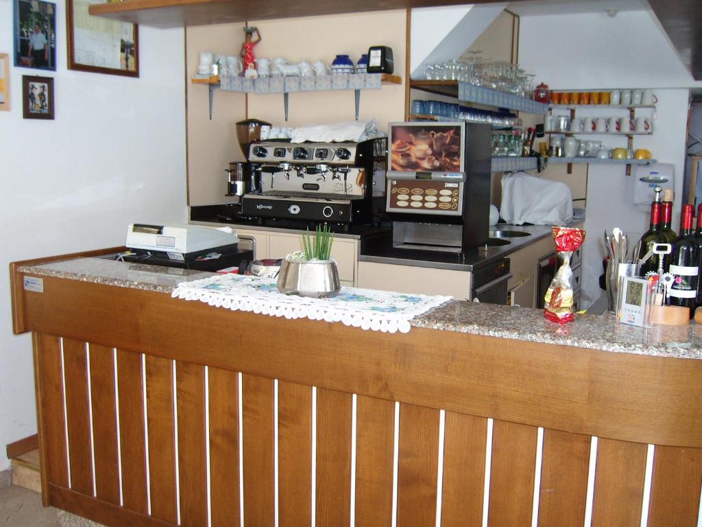 Kuchyň nebo kuchyňský kout v ubytování Hotel Villa Carla